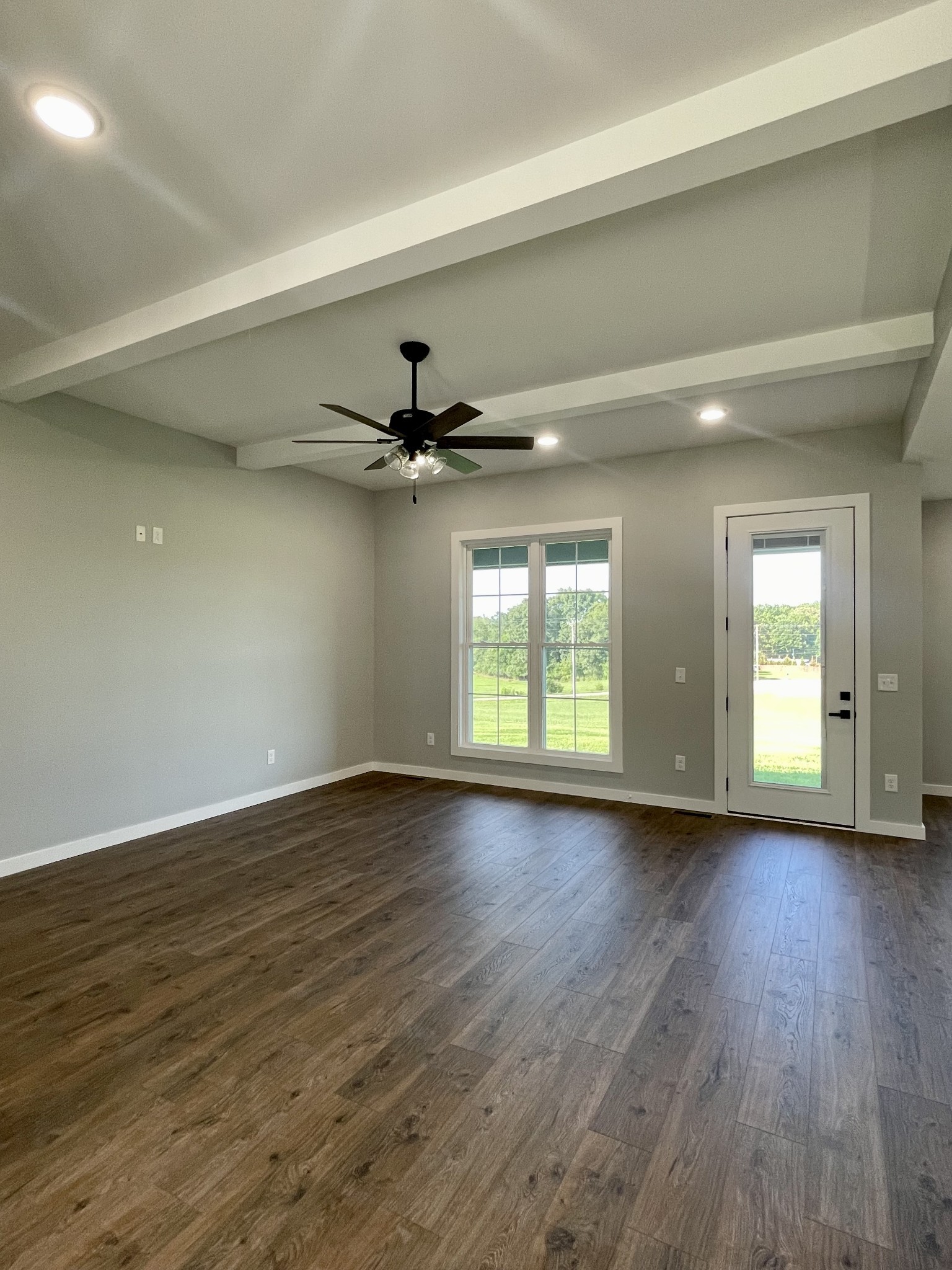 1456 Fall River Road Lawrenceburg, TN 38464 - Photo 5 of 30 wooden floor in an empty room with a window