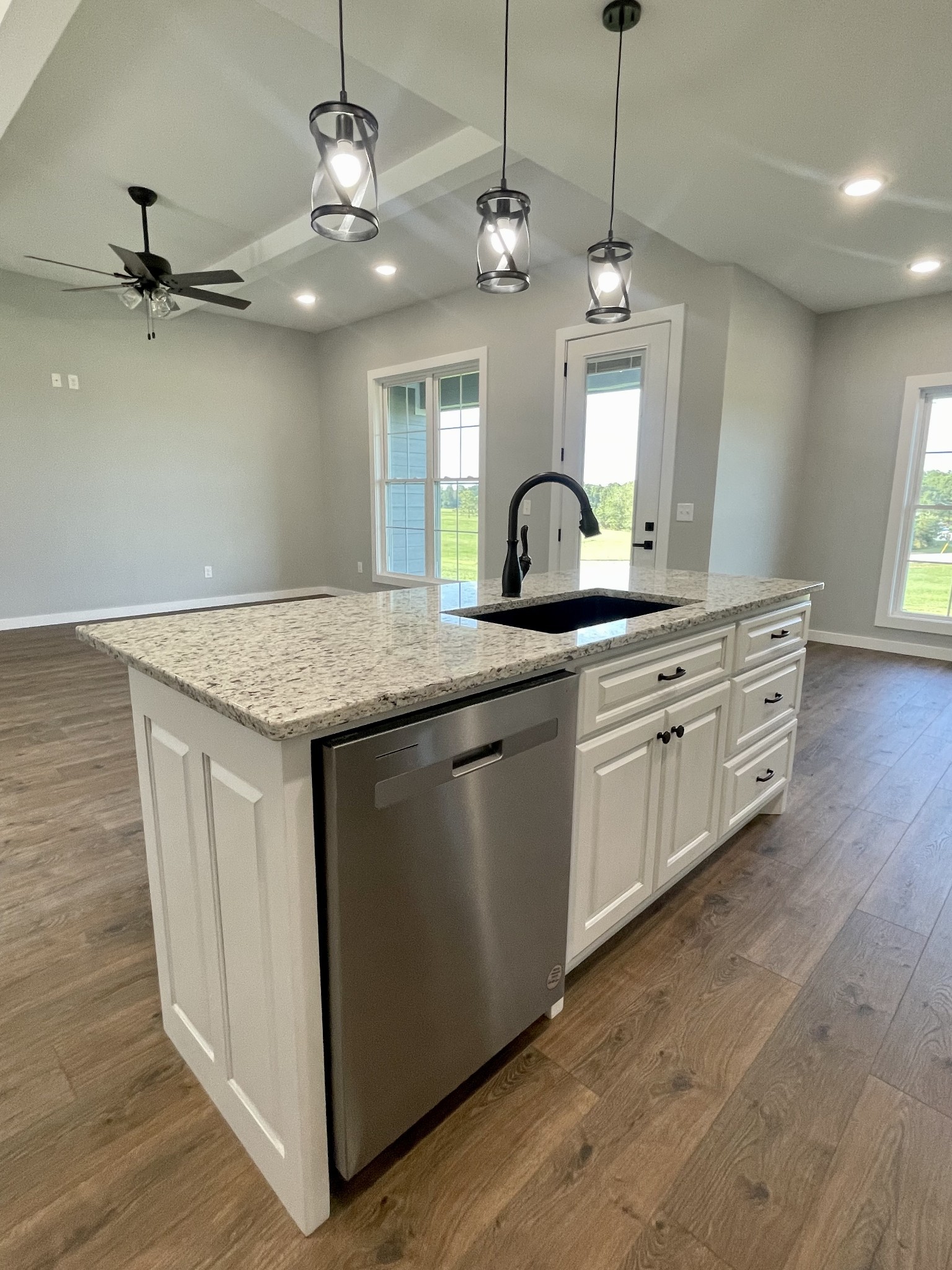 1456 Fall River Road Lawrenceburg, TN 38464 - Photo 9 of 30 a kitchen with a sink and dishwasher