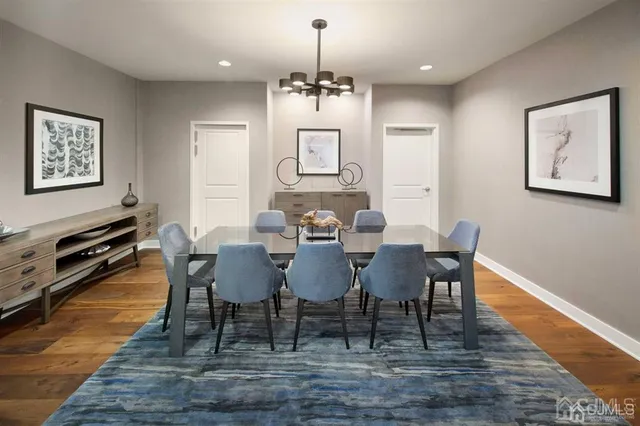 a dining room filled with furniture and window