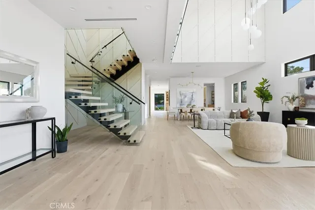 a view of a dining room with furniture and window