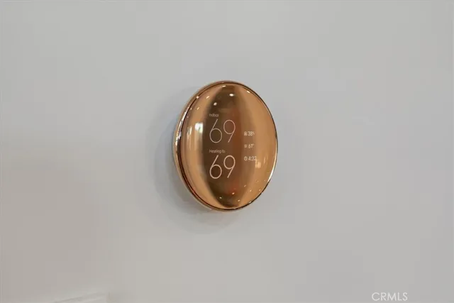 a view of living room with furniture and potted plant