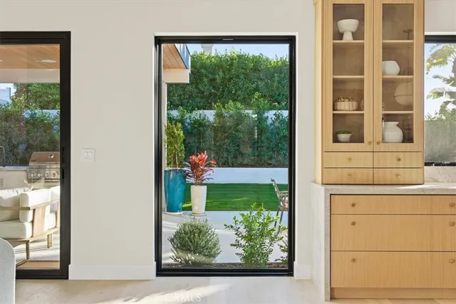 a kitchen with a sink cabinets and counter top space
