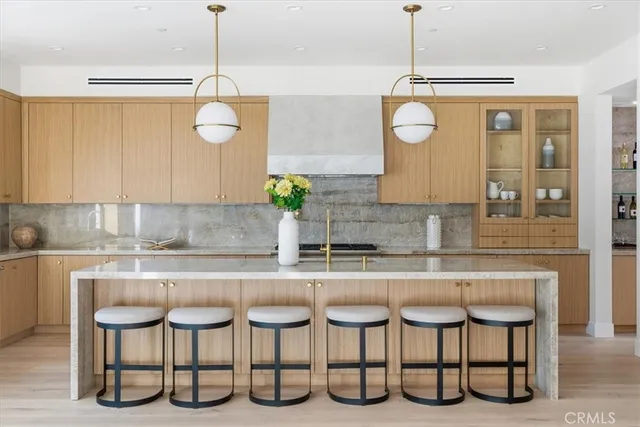 a bedroom with a bed and large window