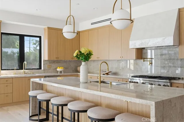 a bedroom with a large bed and a couch