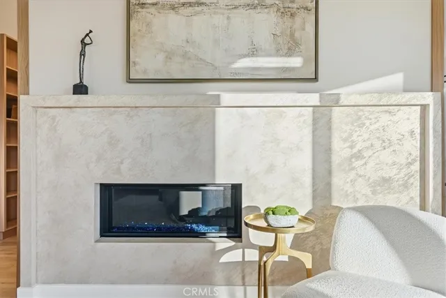 an aerial view of residential building with parking