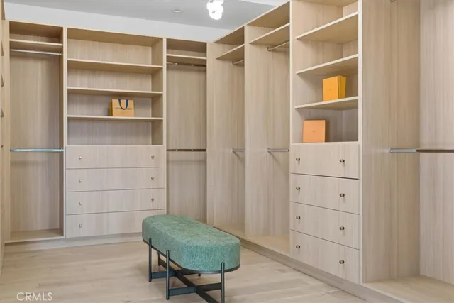 an aerial view of residential houses with city view