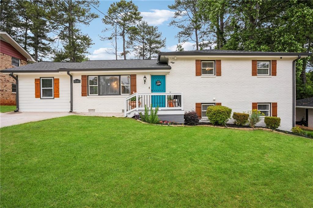 2240 Clanton Terrace Decatur, GA 30034 - Photo 1 of 1 a front view of house with yard and green space