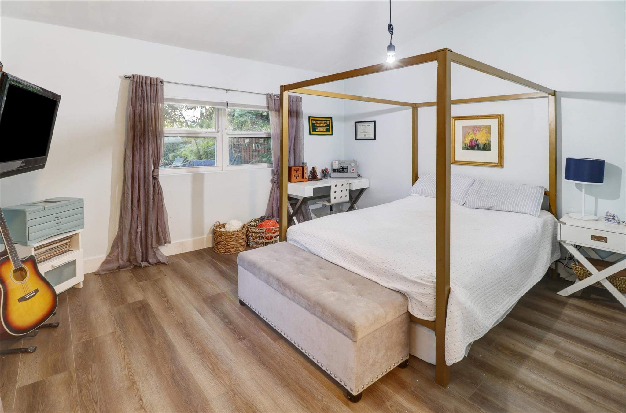 11410 Griffing Boulevard Miami, FL 33161 - Photo 23 of 42 a bed room with a bed and a tv