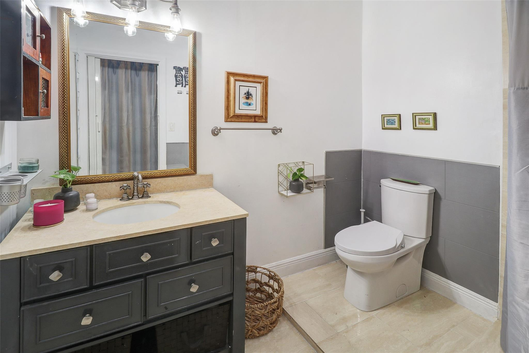 11410 Griffing Boulevard Miami, FL 33161 - Photo 24 of 42 a bathroom with a sink and a toilet