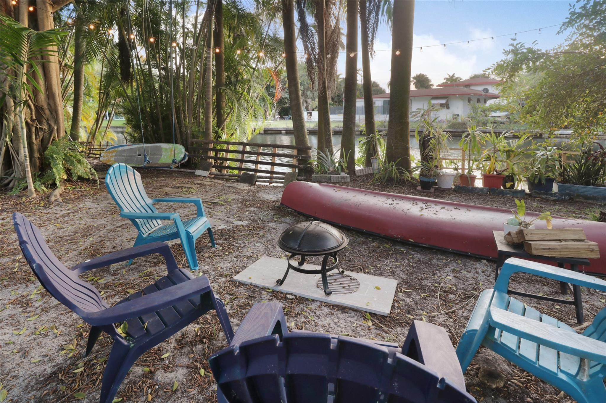 11410 Griffing Boulevard Miami, FL 33161 - Photo 29 of 42 a view of a chairs and tables in the back yard of the house