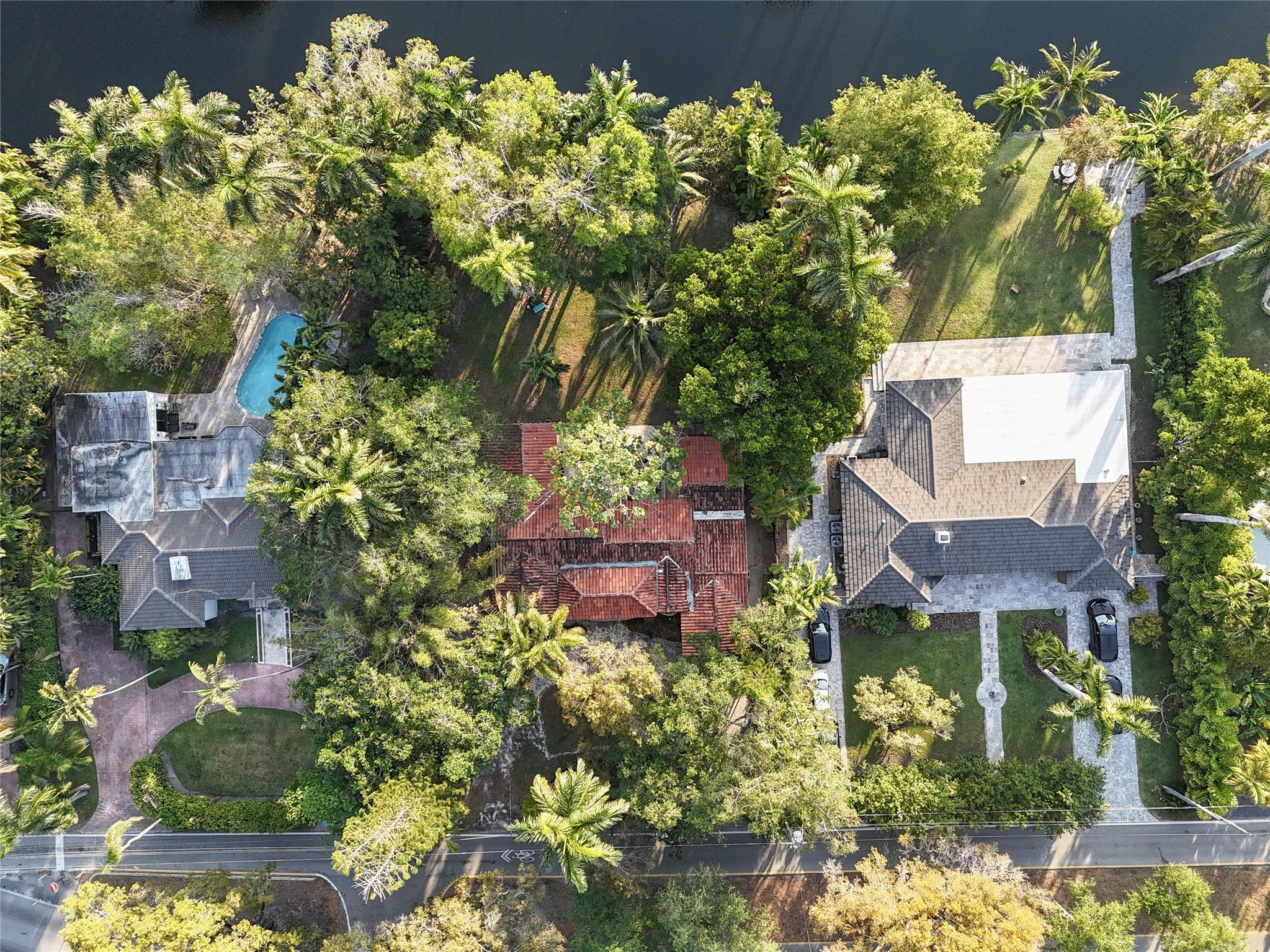 11410 Griffing Boulevard Miami, FL 33161 - Photo 36 of 42 an aerial view of a house with a yard and garden
