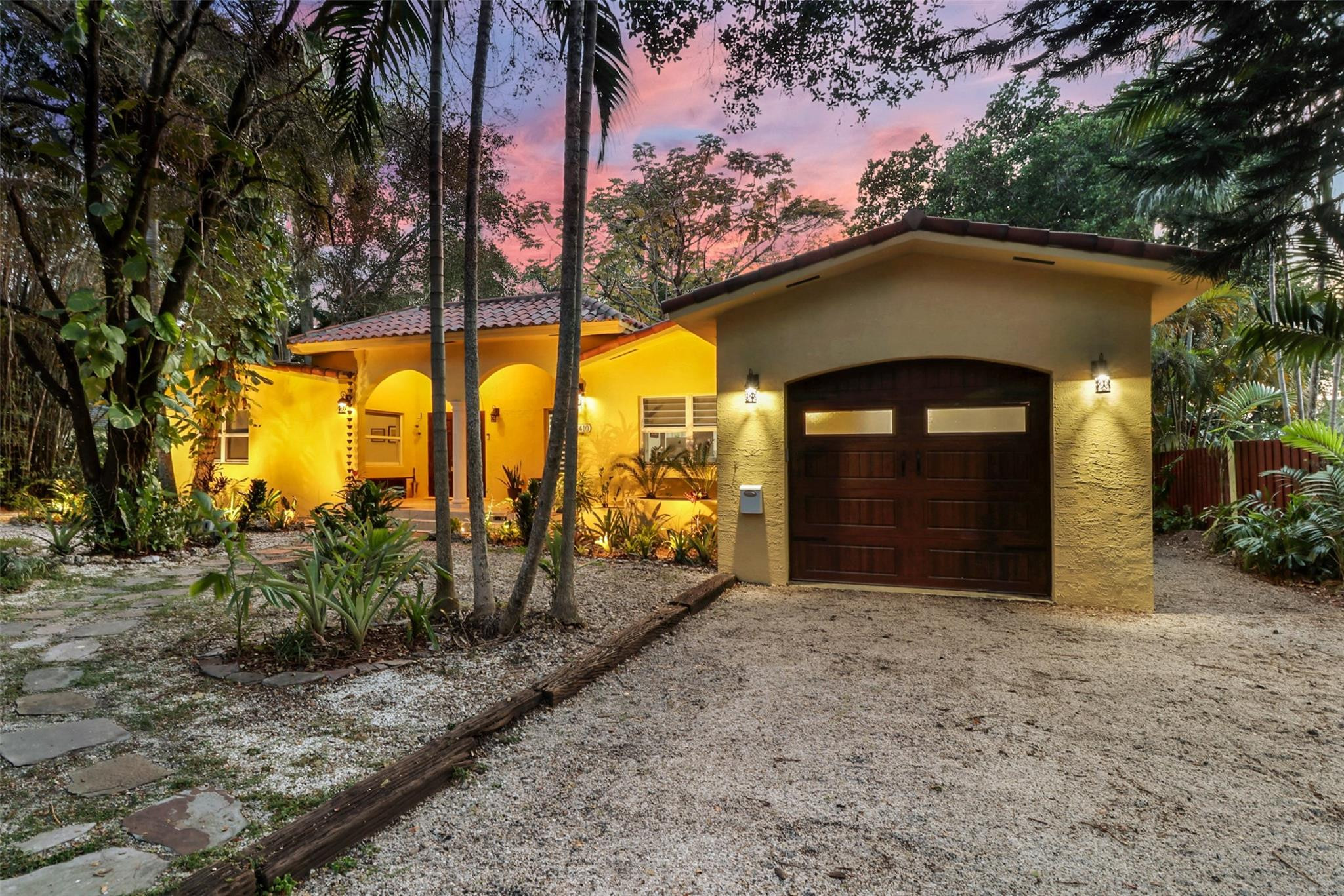 11410 Griffing Boulevard Miami, FL 33161 - Photo 42 of 42 a front view of a house with a yard
