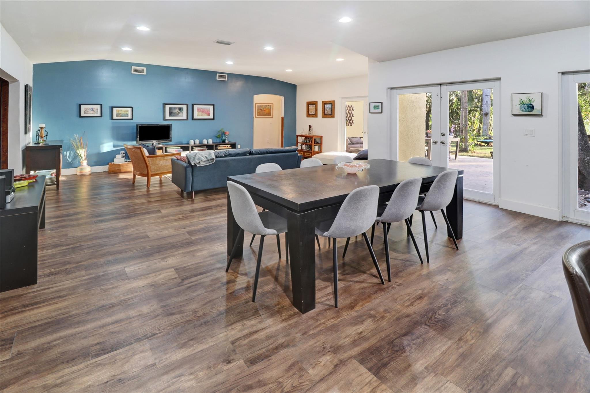 11410 Griffing Boulevard Miami, FL 33161 - Photo 7 of 42 a view of a dining room with furniture window and wooden floor
