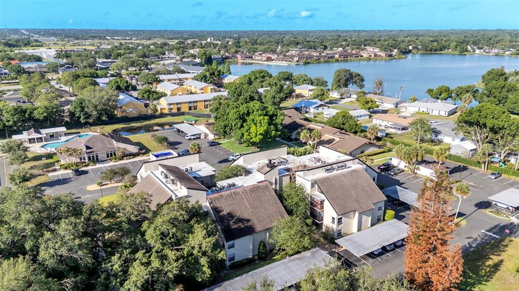 2025 Sylvester Road, Unit N305 Lakeland, FL 33803 - Photo 33 of 34 an aerial view of a house with a lake view