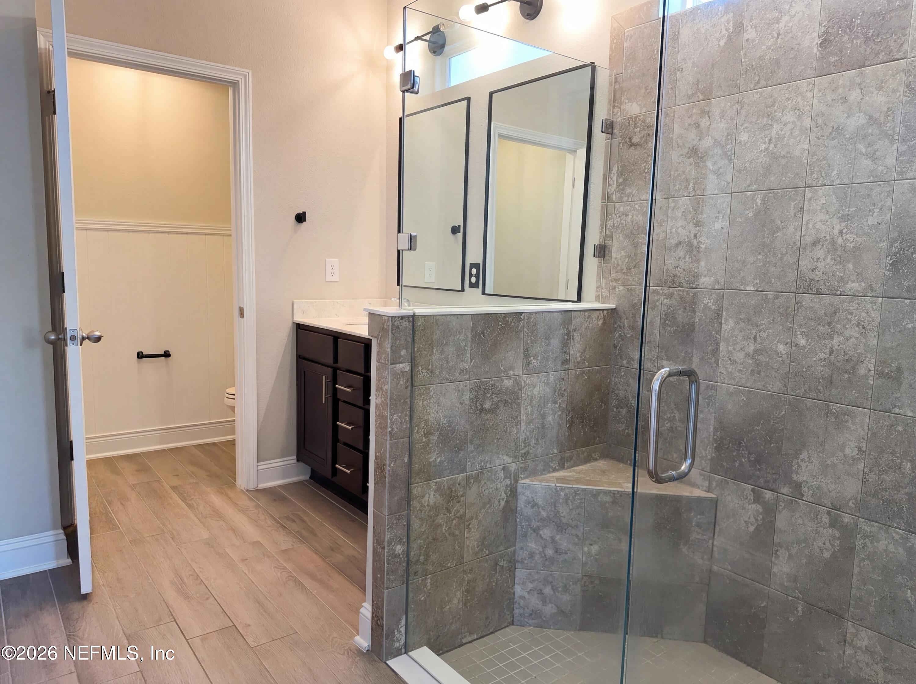 56 Thistleton Way Street St. Augustine, FL 32092 - Photo 18 of 28 a bathroom with a shower and a sink
