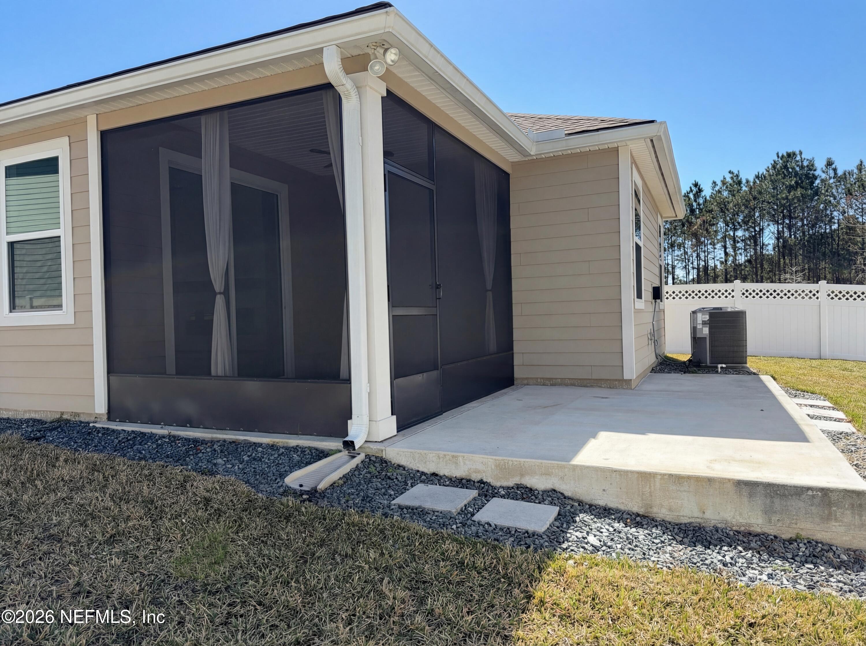 56 Thistleton Way Street St. Augustine, FL 32092 - Photo 5 of 28 a view of house with backyard space and tub