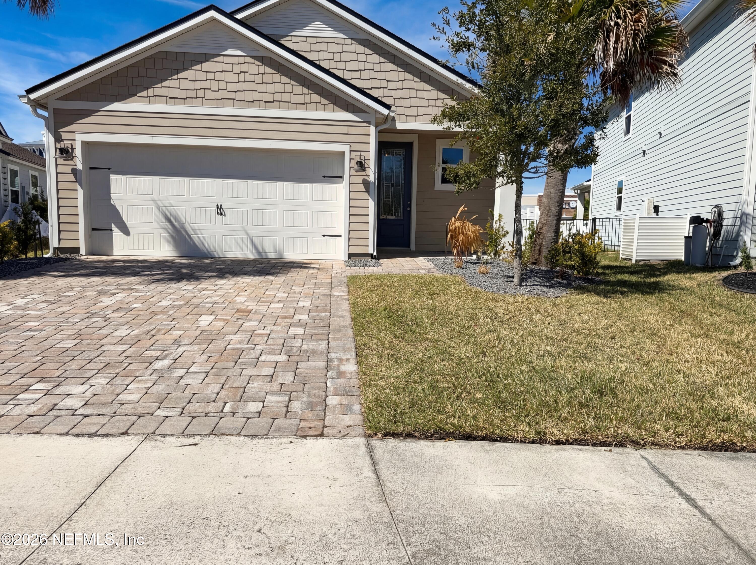 56 Thistleton Way Street St. Augustine, FL 32092 - Photo 7 of 28 a view of a house with snow on the road