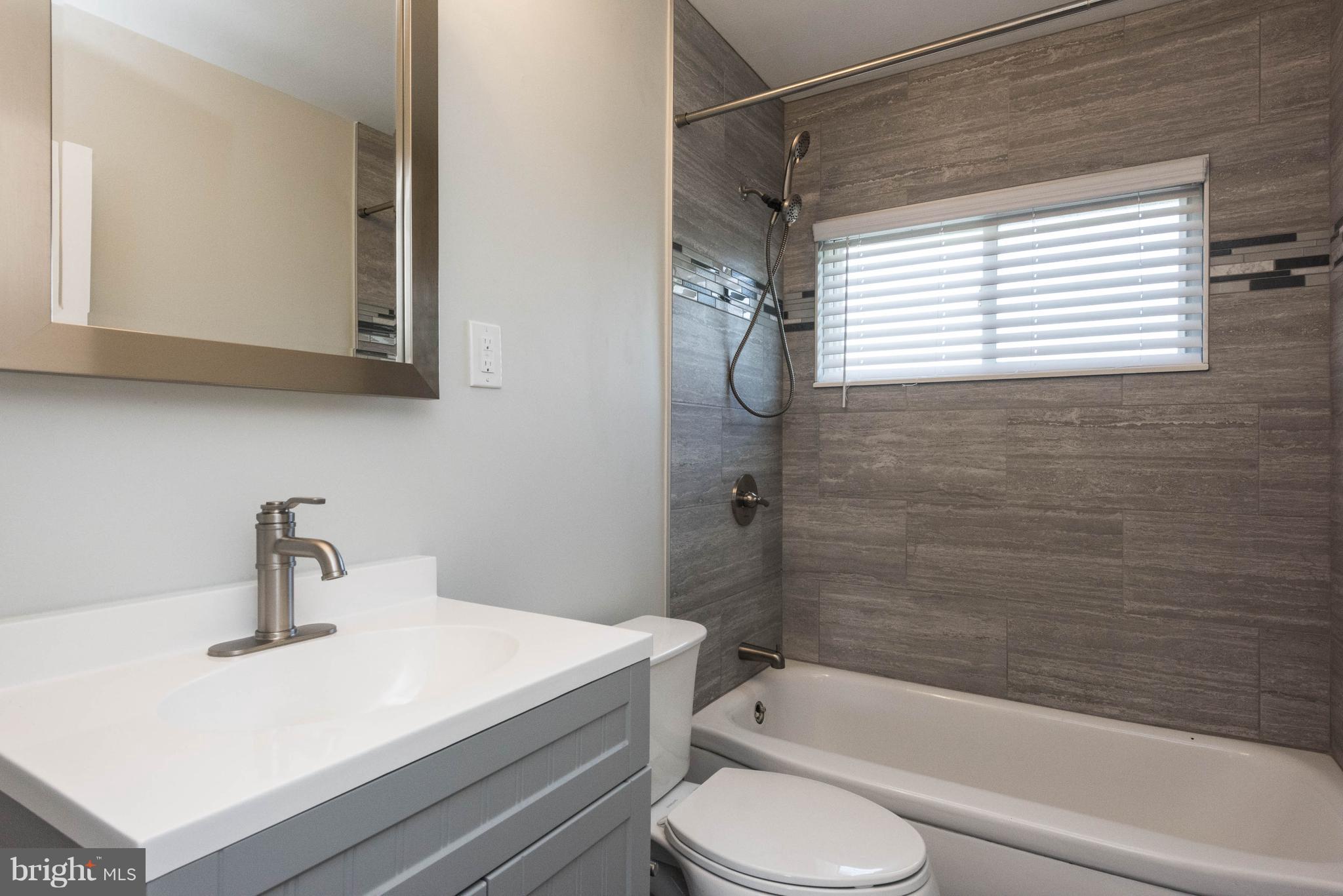 1012 Collwood Road Baltimore, MD 21228 - Photo 16 of 28 New Tile Wall