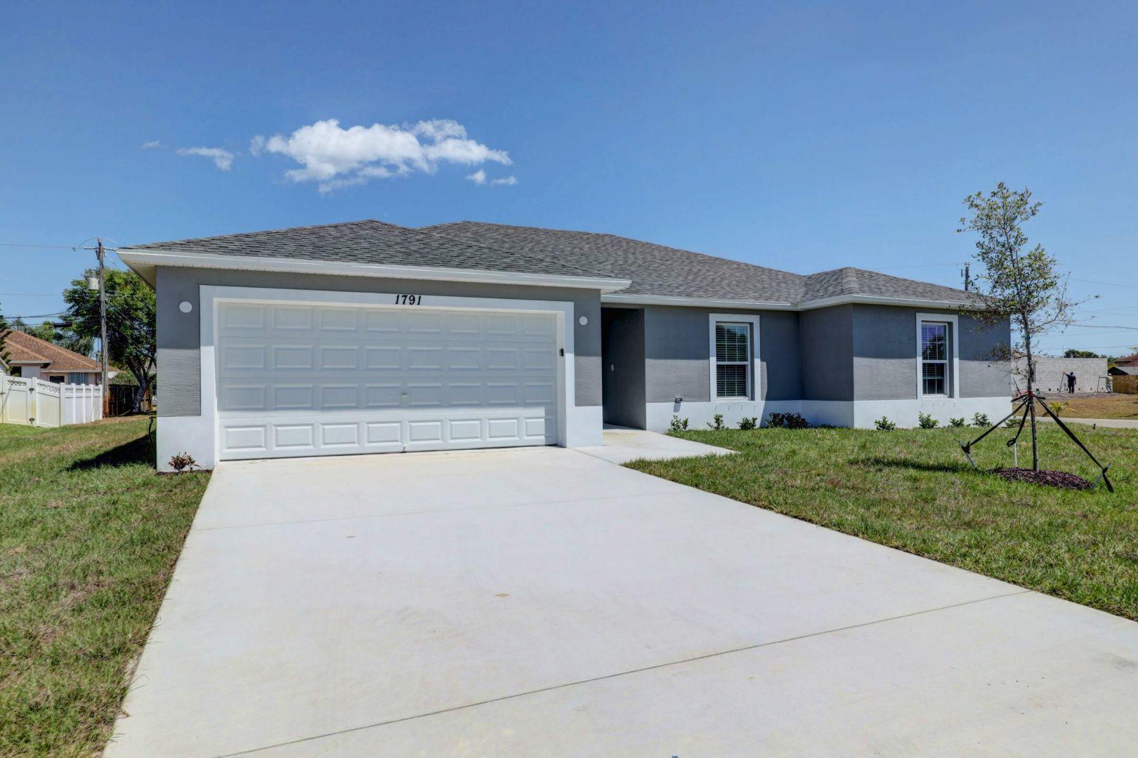 537 Southwest Aster Road Port St. Lucie, FL 34953 - Photo 2 of 55 02_3j0a4784_5_6_7_8