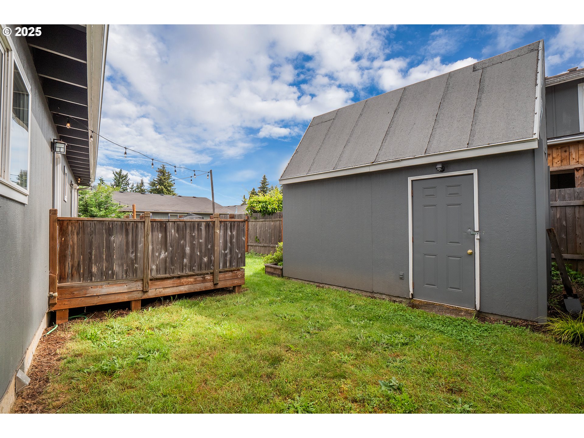 2111 South Bertelsen Road Eugene, OR 97405 - Photo 24 of 32 a view of backyard with wooden fence