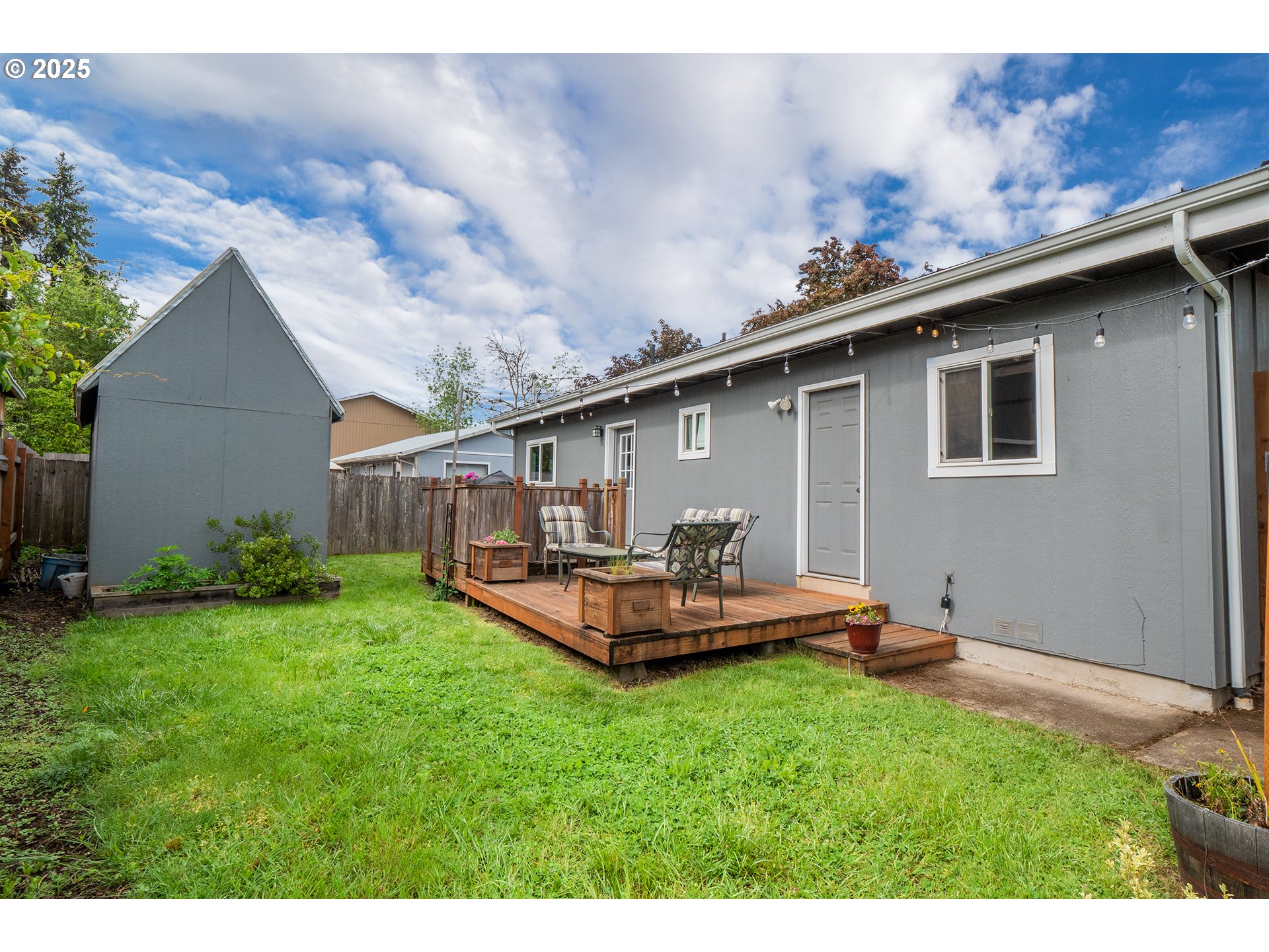 2111 South Bertelsen Road Eugene, OR 97405 - Photo 25 of 32 a front view of house with yard and seating area