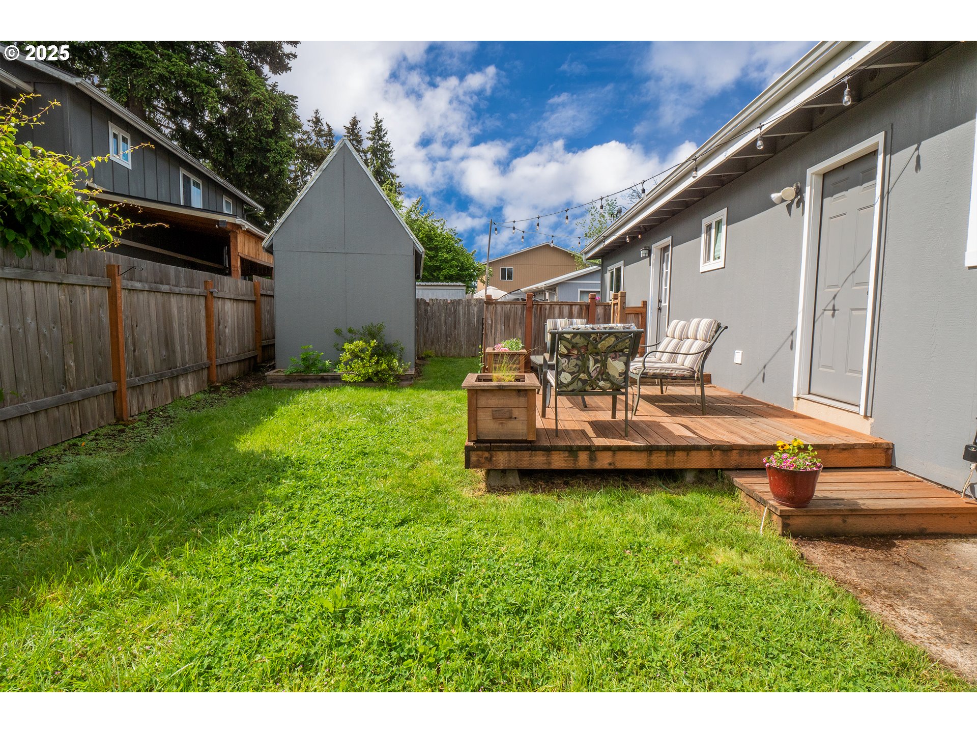 2111 South Bertelsen Road Eugene, OR 97405 - Photo 28 of 32 a view of a house with backyard and sitting area