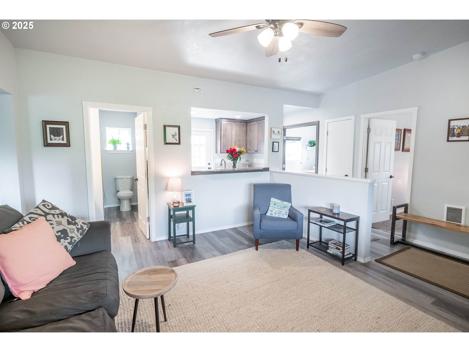 2111 South Bertelsen Road Eugene, OR 97405 - Photo 4 of 32 a living room with furniture and a dining table