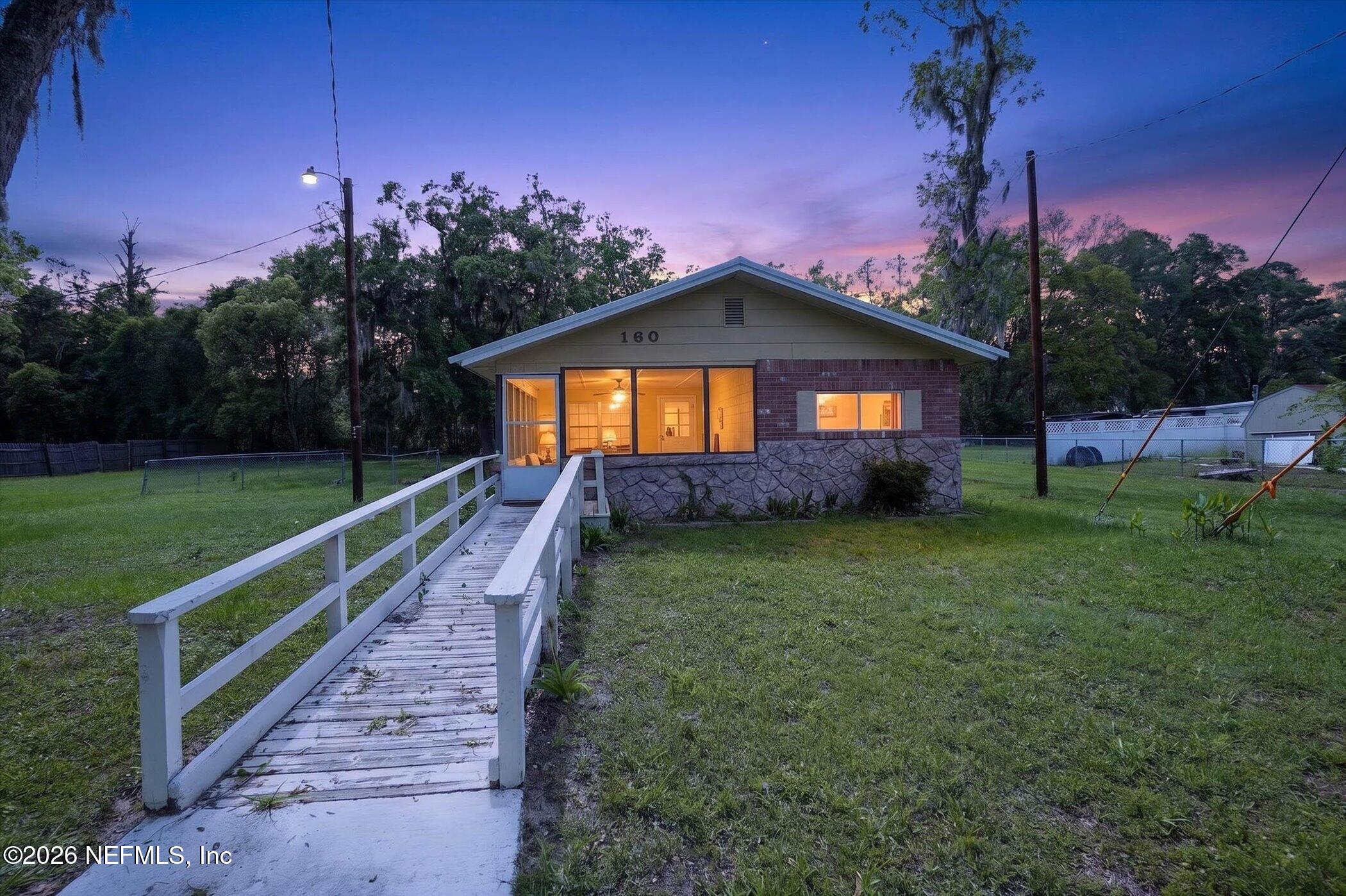 160 Southwest 9th Avenue Lake Butler, FL 32054 - Photo 2 of 42 01-160-SW-9th-Ave-WindowStill-Photograph