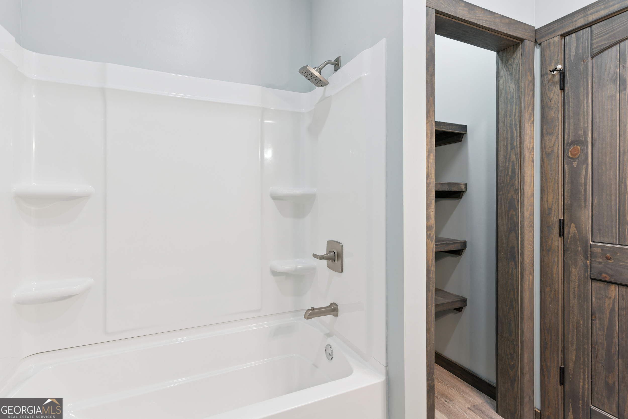 29 Chisholm Street Nahunta, GA 31553 - Photo 26 of 49 a bathroom with a bathtub