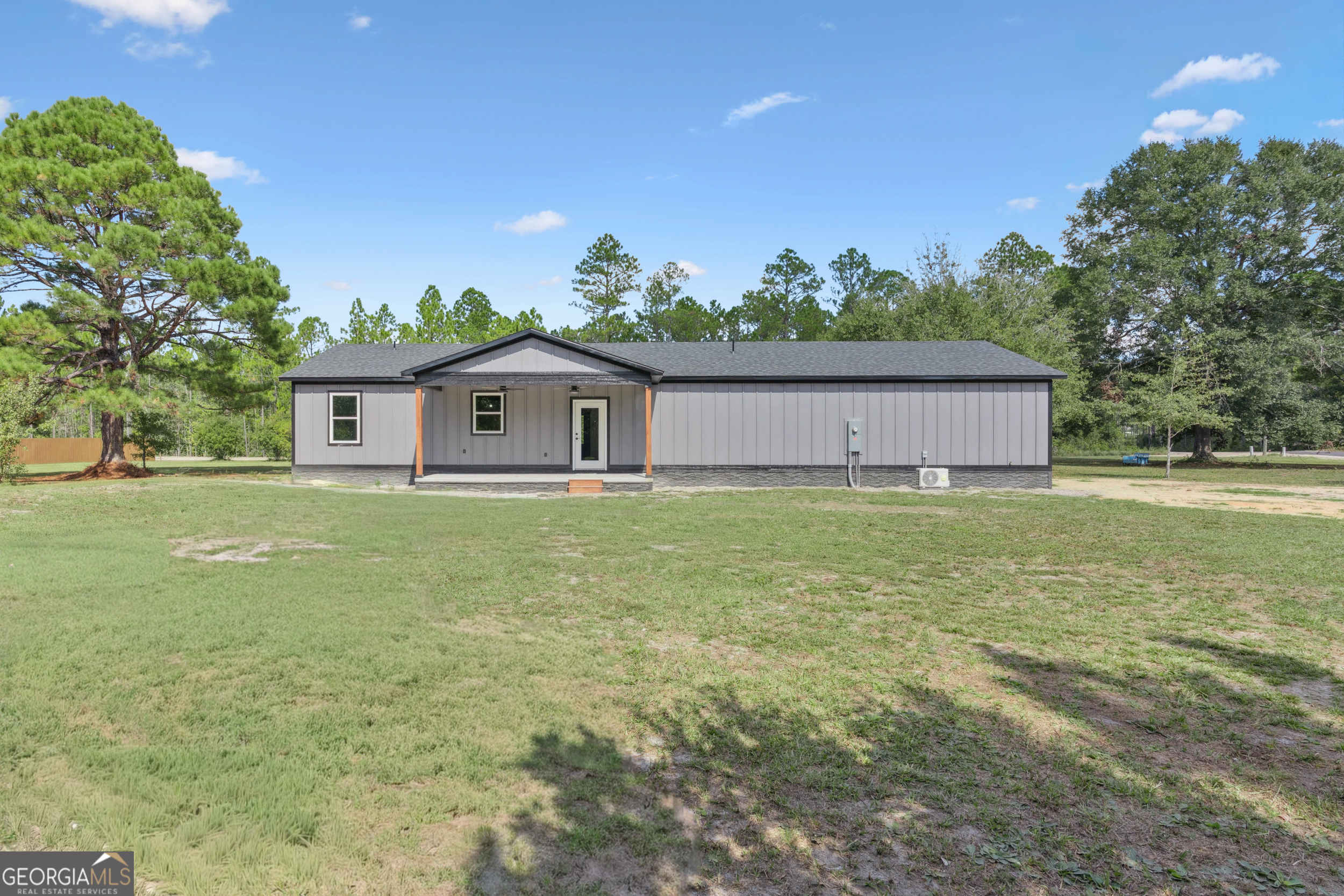 29 Chisholm Street Nahunta, GA 31553 - Photo 31 of 49 a front view of house with garden