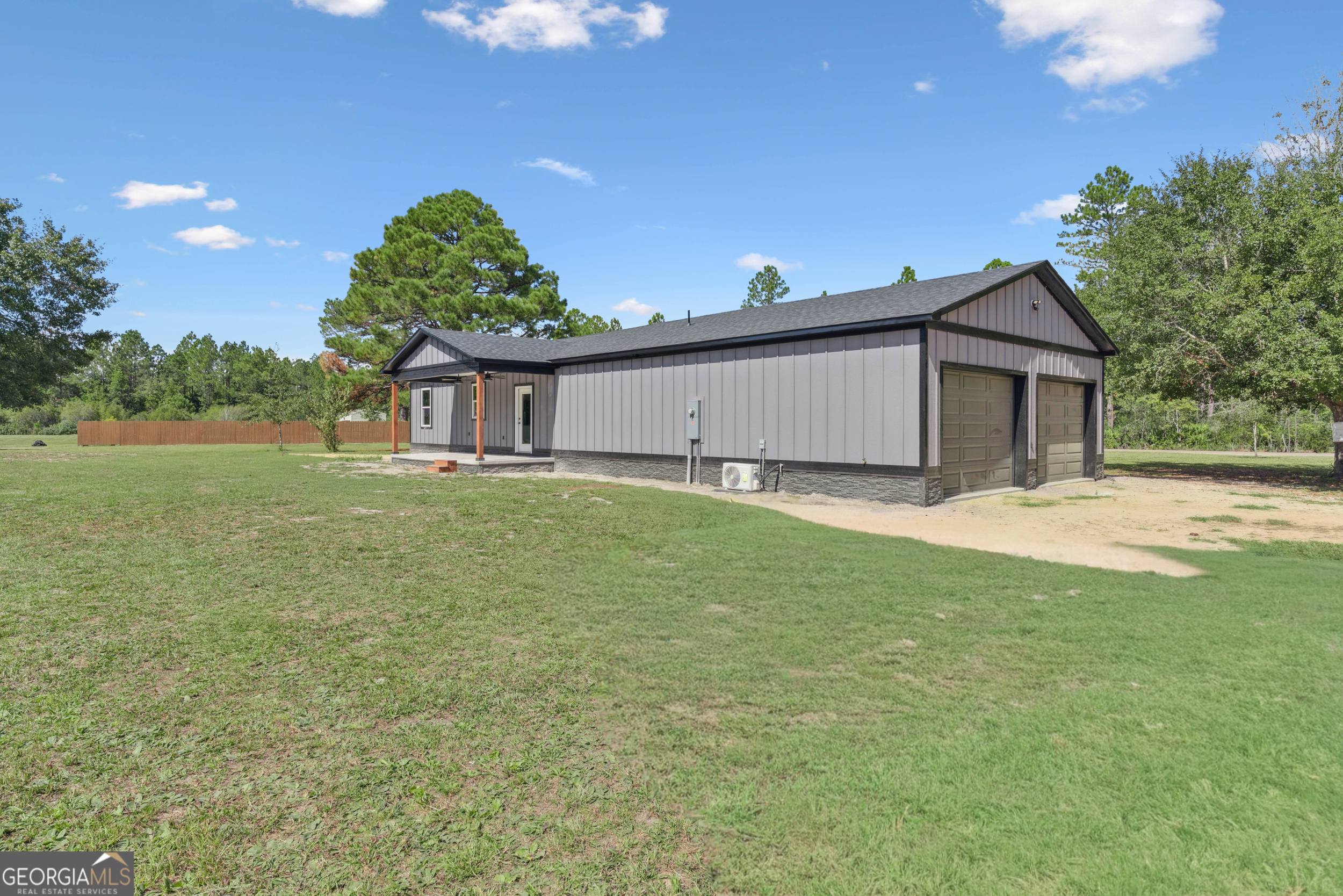 29 Chisholm Street Nahunta, GA 31553 - Photo 32 of 49 a house view with swimming pool and garden space