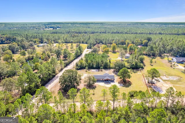 a view of lake with green space