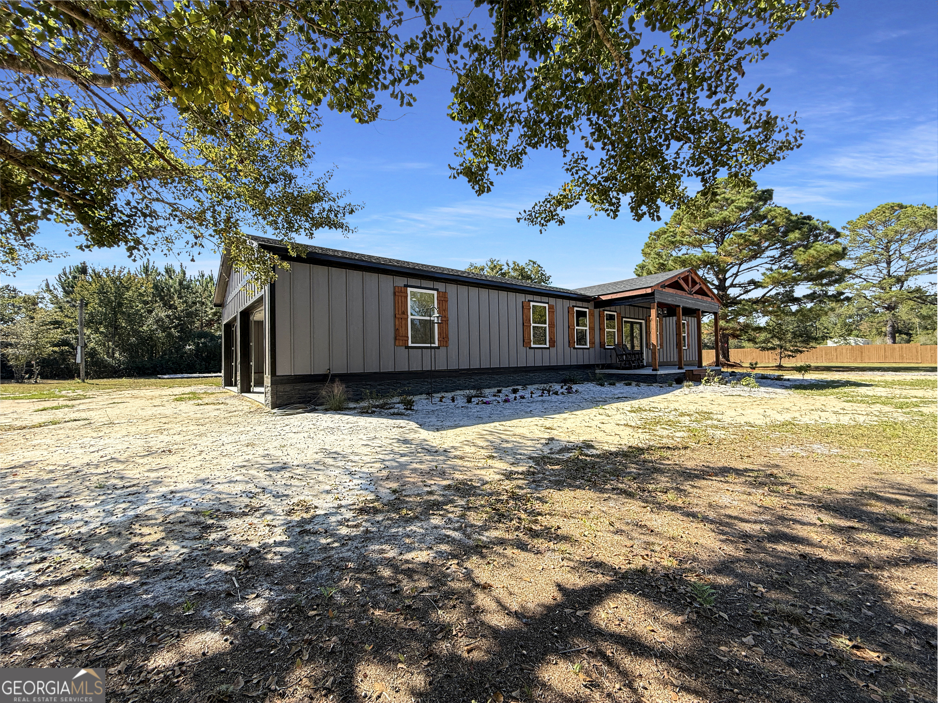 29 Chisholm Street Nahunta, GA 31553 - Photo 43 of 49 a house view with a swimming pool