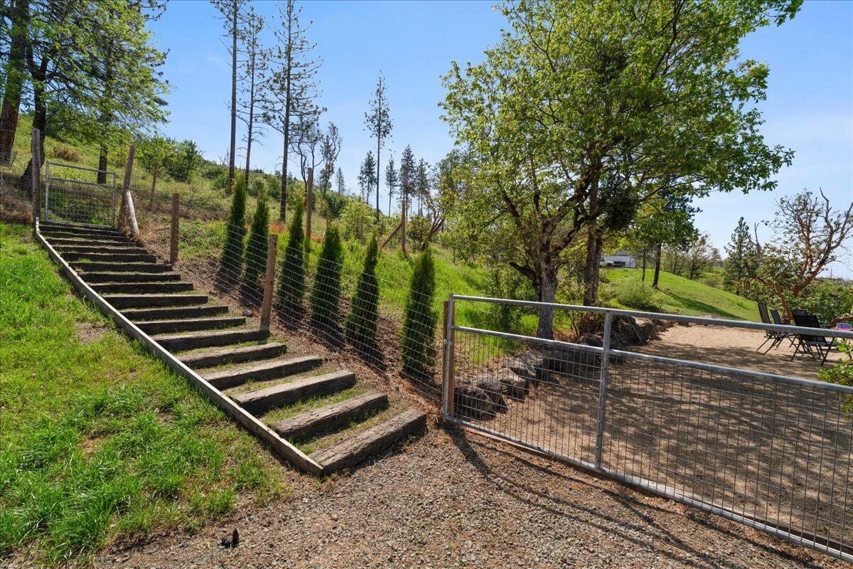 2220 Butte Falls Highway Eagle Point, OR 97524 - Photo 51 of 69 a view of a backyard with trees