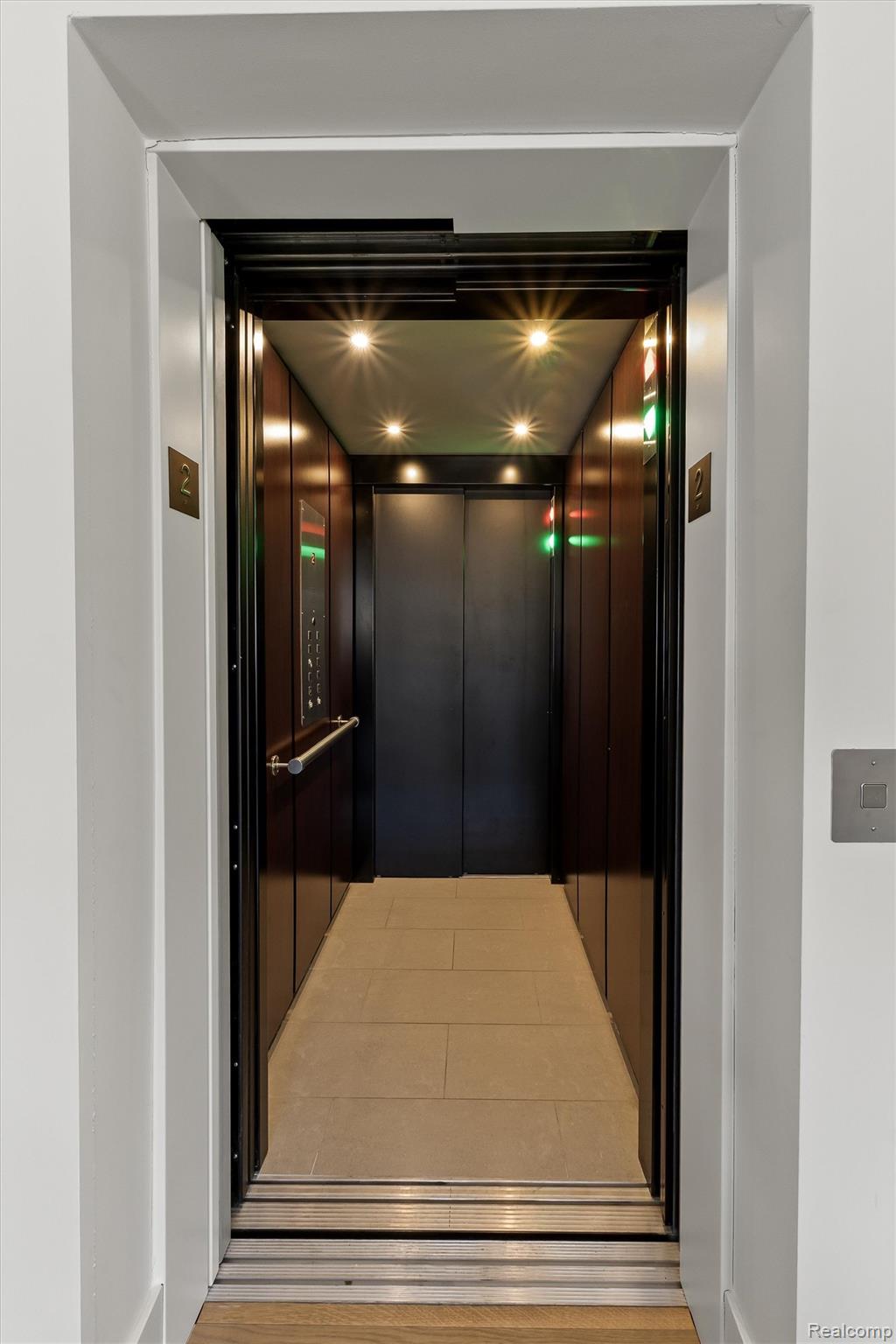 936 West Eleven Mile Road Royal Oak, MI 48067 - Photo 15 of 19 Elevator with wood finished floors