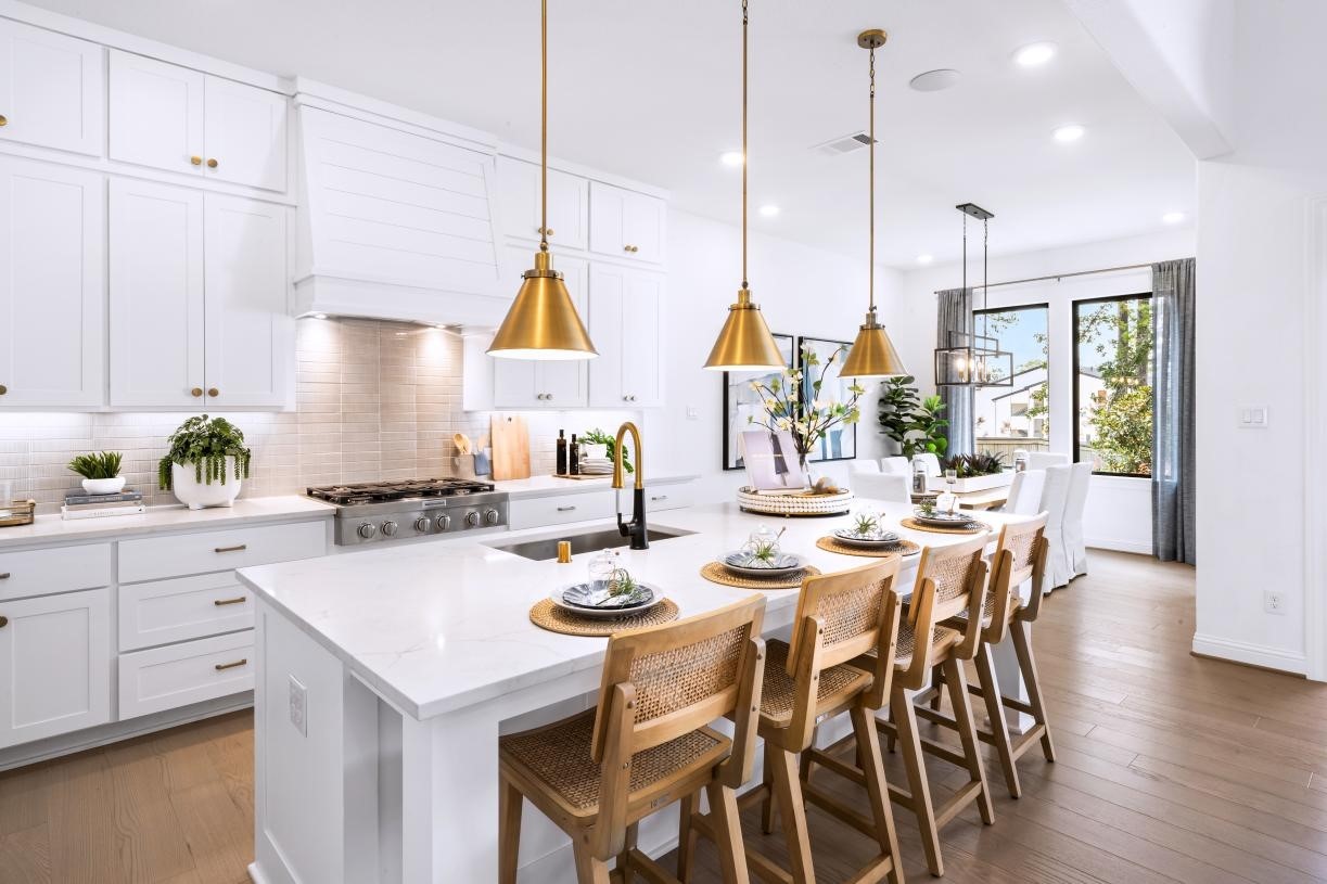 28037 Pebble Pk Drive Spring, TX 77386 - Photo 6 of 16 a view of a dining room and livingroom with furniture wooden floor a chandelier