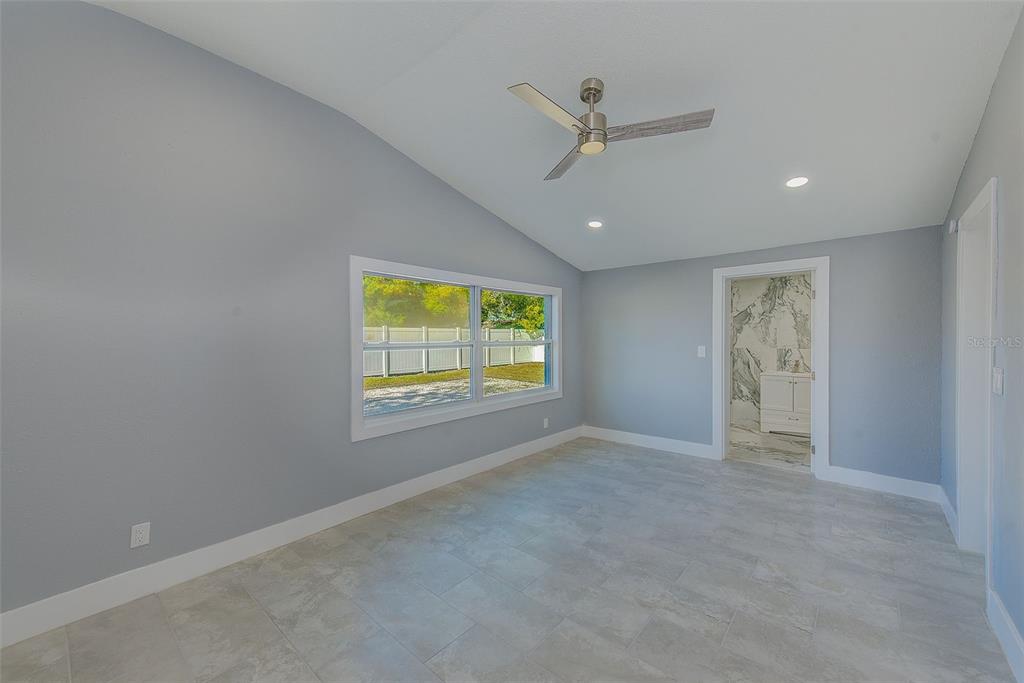 6208 Florida Circle East Apollo Beach, FL 33572 - Photo 17 of 43 a view of an empty room with a window