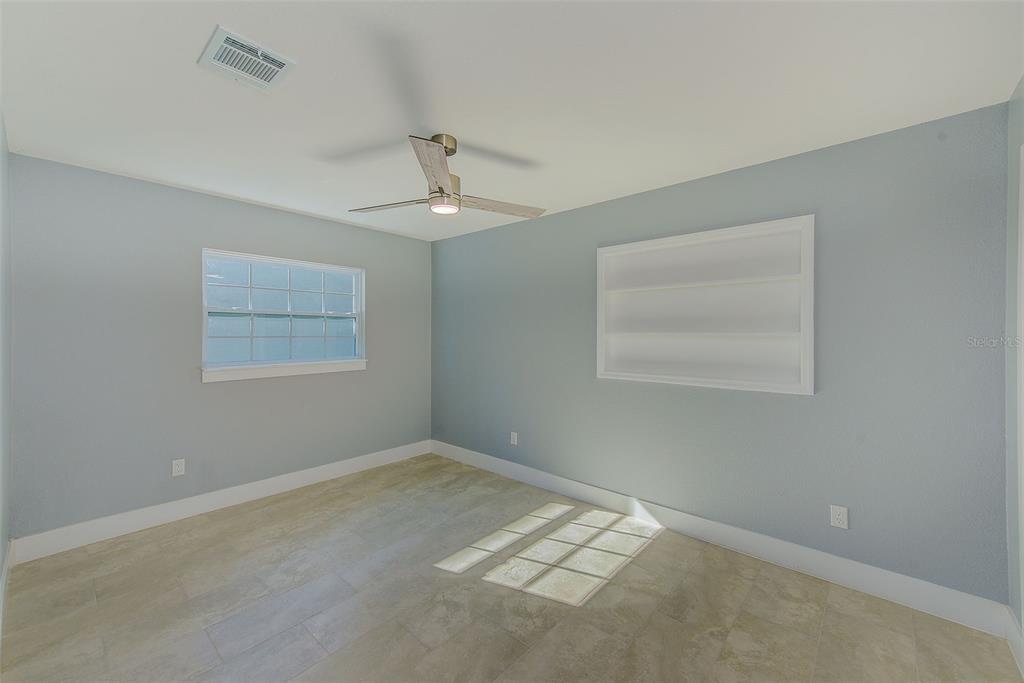 6208 Florida Circle East Apollo Beach, FL 33572 - Photo 22 of 43 a view of an empty room with a window