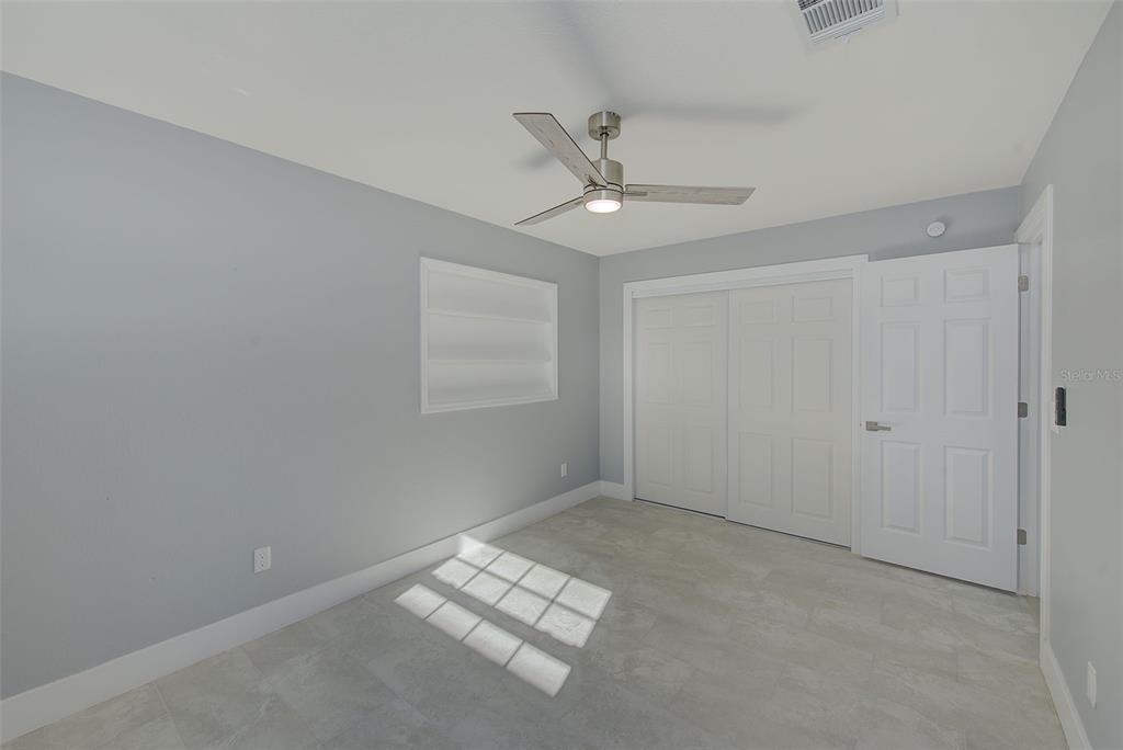 6208 Florida Circle East Apollo Beach, FL 33572 - Photo 23 of 43 wooden floor in an empty room