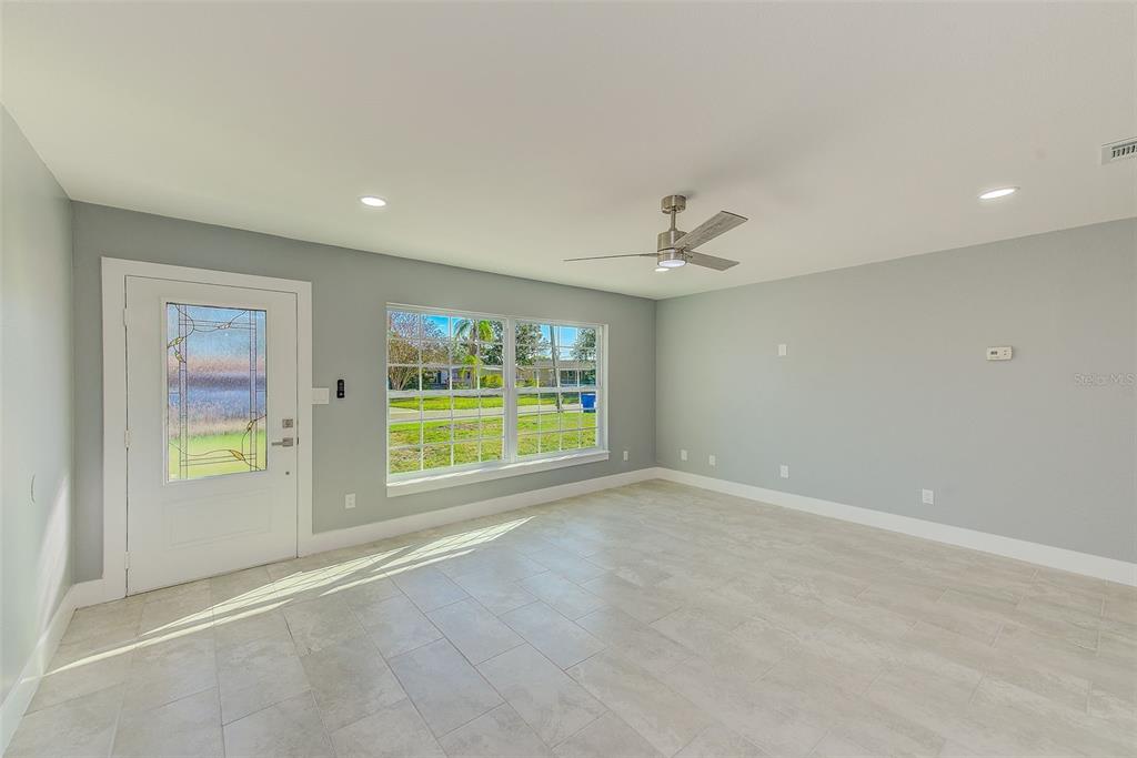 6208 Florida Circle East Apollo Beach, FL 33572 - Photo 3 of 43 a view of an empty room with a window