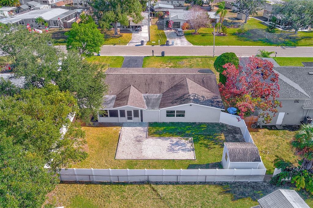 6208 Florida Circle East Apollo Beach, FL 33572 - Photo 39 of 43 an aerial view of a house with a swimming pool yard and outdoor seating