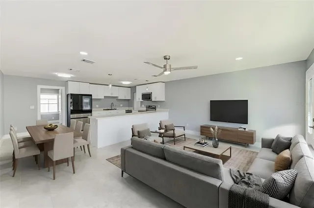 a kitchen with granite countertop a stove and a sink
