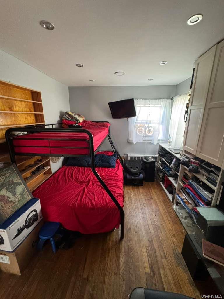 35 Harvard Street Valley Stream, NY 11580 - Photo 14 of 19 Bedroom with dark wood-type flooring and recessed lighting