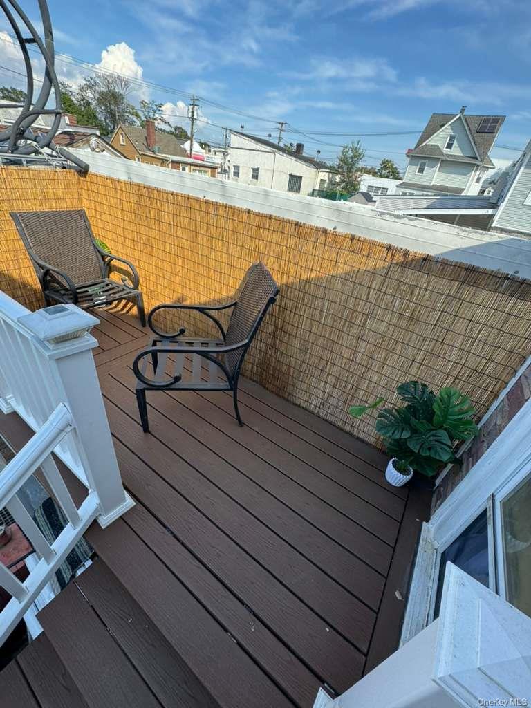 35 Harvard Street Valley Stream, NY 11580 - Photo 7 of 19 View of wooden deck
