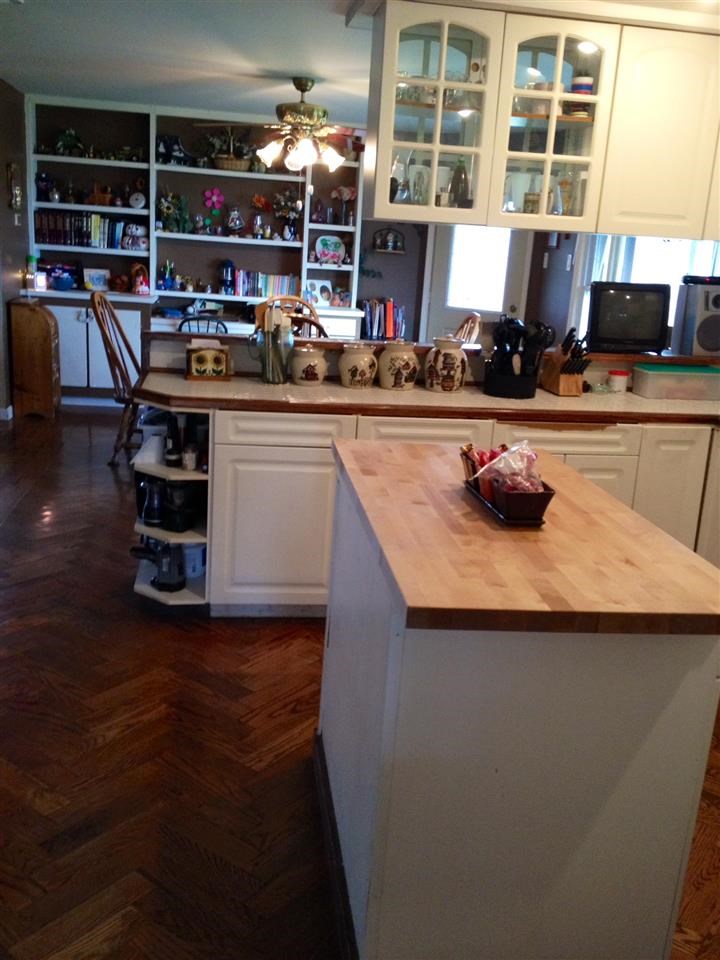 6838 North Bellview Road Freeport, IL 61032 - Photo 5 of 22 a kitchen with a counter top space appliances and cabinets