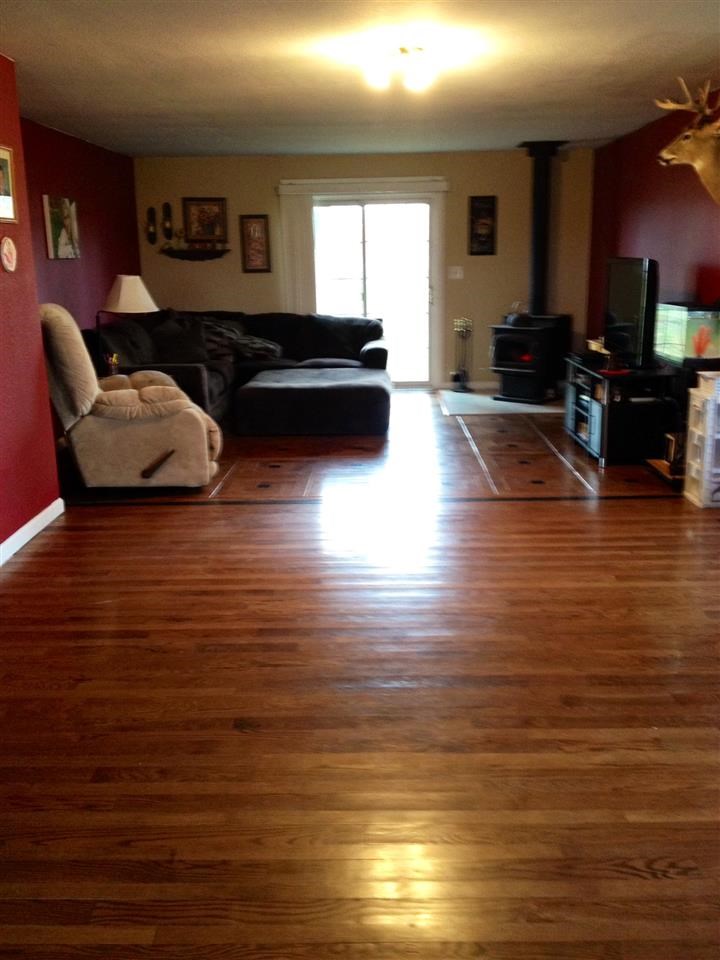 6838 North Bellview Road Freeport, IL 61032 - Photo 8 of 22 a living room with furniture and a large window