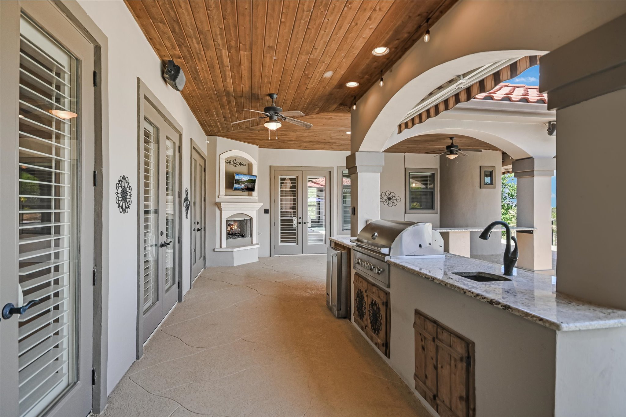 228 Puzzle Pass Spring Branch, TX 78070 - Photo 29 of 35 Conveniently located just off the main kitchen, this outdoor kitchen makes indoor-outdoor entertaining easy.