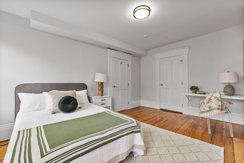 9 Bond Street Boston, MA 02118 - Photo 13 of 21 a bedroom with a bed and a view of bedroom