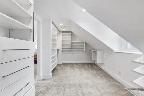 a view of an empty walk in closet