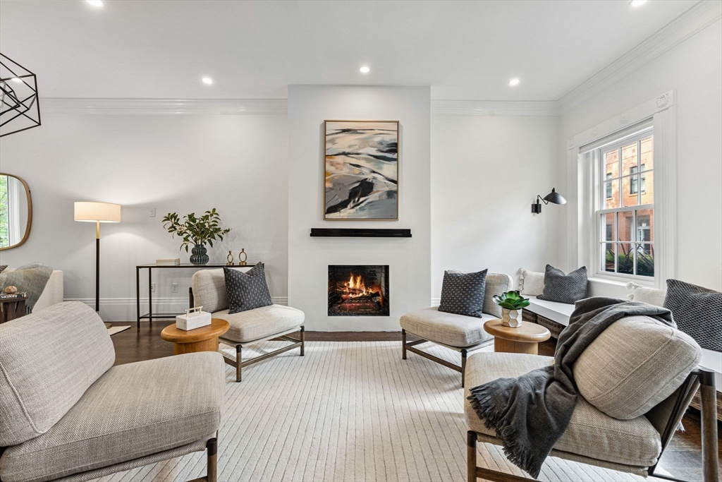 9 Bond Street Boston, MA 02118 - Photo 3 of 21 a living room with furniture and a fireplace